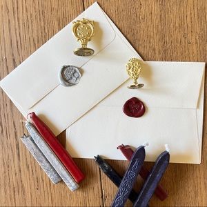 Set of wax seal stamps and wax sticks